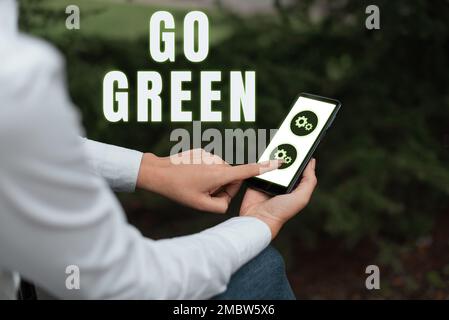 Handwriting text Go Green. Word for making more environmentally friendly decisions as reduce recycle Stock Photo
