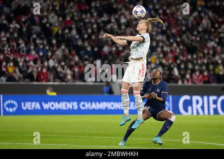 Bayern's Giulia Gwinn heads the ball during the women's quarterfinal Champions  League first leg soccer match between Bayern Munich and Paris Saint-Germain  in Munich, Germany, Tuesday, March 22, 2022. (AP Photo/Matthias Schrader