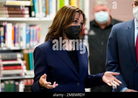 Vice President Kamala Harris talks while touring the Armand J