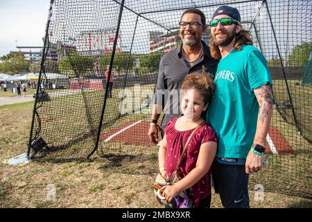 Gary Sheffield, left, poses with fans at the Innings Festival at