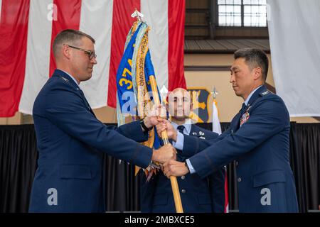 Col. Jun Oh, 374th Operations Group incoming commander, renders his ...
