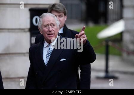 Britain's Prince Charles, the Prince of Wales, points as he arrives at the annual Commonwealth Day Reception which traditionally takes place on Commonwealth Day at Marlborough House, the home of the Commonwealth Secretariat, in London, Monday, March 14, 2022. (AP Photo/Frank Augstein, Pool)