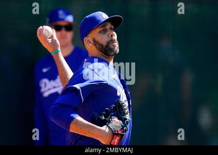 Los Angeles Dodgers pitcher David Price adjusts his hat during a spring  training baseball workout Sunday, March 13, 2022, in Phoenix. (AP  Photo/Ross D. Franklin Stock Photo - Alamy