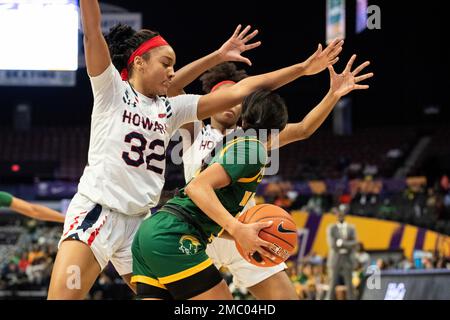 Norfolk State guard Armani Franklin 11 drives in for a score