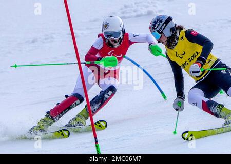 Veronika Aigner of Austria and guide Elisabeth Aigner celebrate