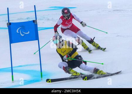 Veronika Aigner of Austria and guide Elisabeth Aigner celebrate