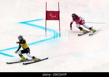 Veronika Aigner of Austria and guide Elisabeth Aigner celebrate