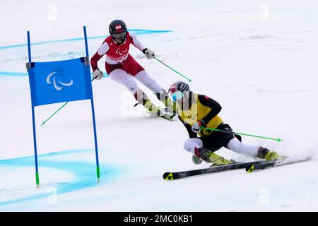 Veronika Aigner of Austria and guide Elisabeth Aigner celebrate