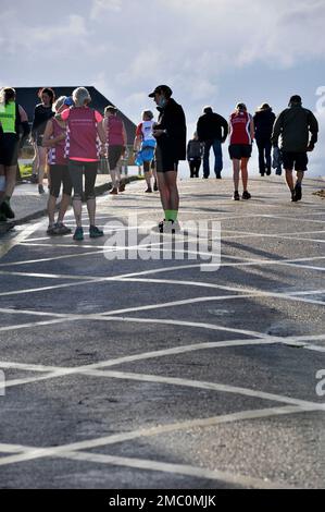 runners have inquest about performance at end of club run at west runton norfolk england Stock Photo