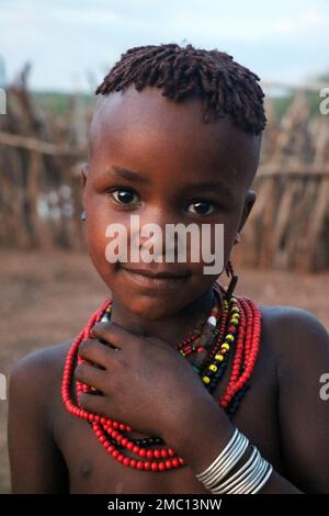 Portrait of ethiopian child in lower Omo valley village, Ethiopia Stock Photo