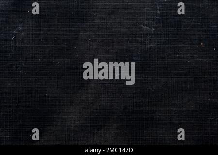 Old threadbare black canvas grunge texture Stock Photo