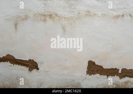 Old weathered white limewashed wall background Stock Photo