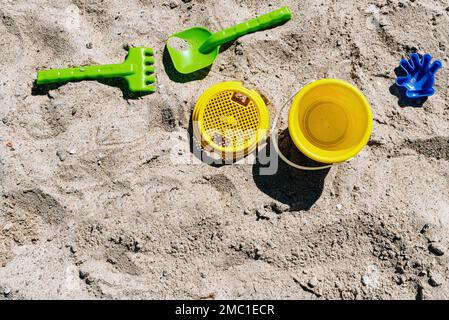 directly above view of sand toys on beach Stock Photo