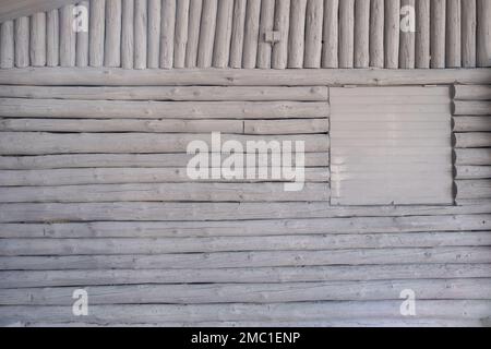White painted wooden logs wall cladding background Stock Photo