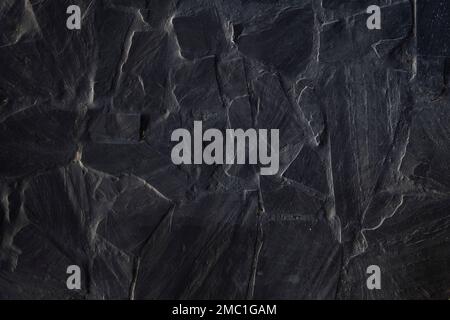 Black slate stone wall texture Stock Photo