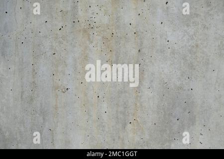 Exposed concrete wall detail grunge background Stock Photo