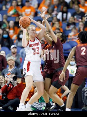 North Carolina State center Elissa Cunane (33) hugs forward Erika ...