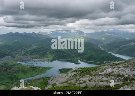 Esla River dam among the rocky Riaño and Mampodre mountains and Picos de Europa in the background, Province of Leon, Spain Stock Photo