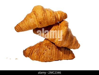 Fresh croissants stack, French bakery composition isolated on white background. High quality photo Stock Photo