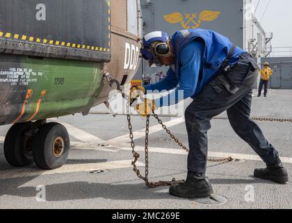 220623-N-TI693-1037    GULF OF ADEN (June 23, 2022) Airman Christopher Hopkins, from Los Angeles, secures a French Army SA 330 Puma to the flight deck aboard the Lewis B. Puller-class expeditionary sea base USS Hershel 'Woody' Williams (ESB 4), June 23, 2022. Hershel “Woody” Williams is rotationally deployed to the U.S. Naval Forces Africa area of operations, employed by U.S. Sixth Fleet, to defend U.S., allied and partner interests. Stock Photo