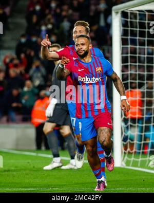 Barcelona's Memphis Depay celebrates scoring his side's 4th goal against Athletic Bilbao during a Spanish La Liga soccer match at the Camp Nou stadium in Barcelona, Spain, Sunday, Feb. 27, 2022. (AP Photo/Joan Monfort)
