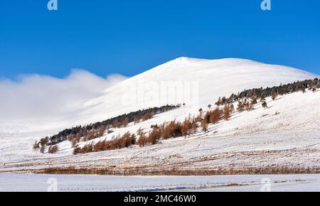 Ben Rinnes Banffshire Scotland the snow covered mountain in January Stock Photo
