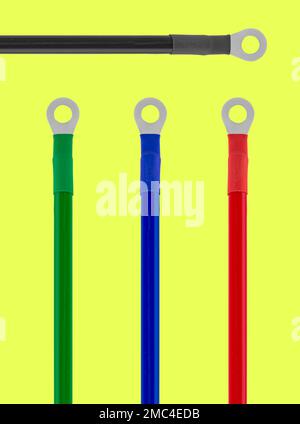 cable with a ring lug, on a yellow background insulated Stock Photo