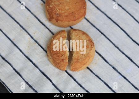 A  broken biscuits cooking sweet,Biscuit cookies bakery on  background. Stock Photo