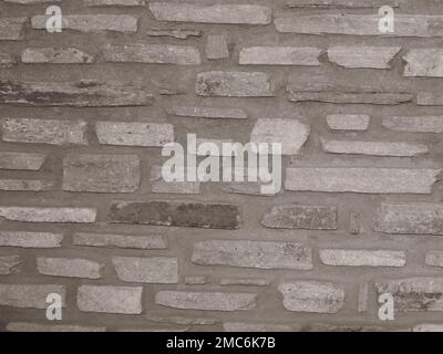 Old grungy stonewall . Strong texture for background backdrop Stock Photo