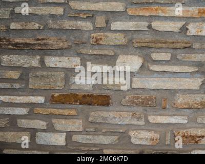 Old grungy stonewall . Strong texture for background backdrop Stock Photo