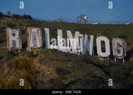 Workers transform the Hollywood sign to read Rams House in Los Angeles on  Monday, Feb. 14, 2022. The Hollywood Chamber of Commerce and the Hollywood  Sign Trust allowed for making the change