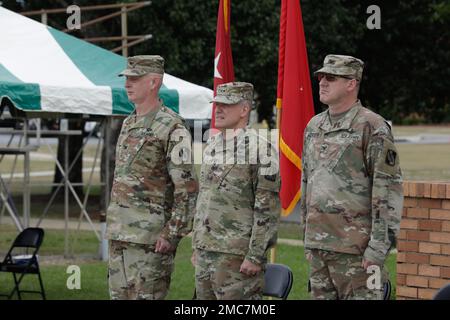 U.S. Army Col. Travis A. Hartman (left) reliquished command of the 359th TTSB to Col. Tracy G. Monteith(right), ceremony was presided over by Major. Gen. John H. Phillips(middle),  commanding general, 335th Signal Command Theater at Barton Field on Fort Gordon in Augusta, GA, June 26, 2022. Stock Photo