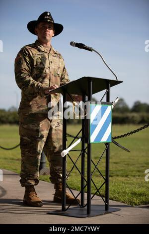 Lt. Col. James E. Perkins, incoming commander of the 'Mustang Squadron,' 6th Squadron, 8th Cavalry Regiment, 2nd Armored Brigade Combat Team, 3rd Infantry Division, addresses Soldiers, Families and distinguished guests as the new commander during the squadron's change of command ceremony on Cottrell Field at Fort Stewart, June 27, 2022. The change of command ceremony signifies the transfer of command and with it the responsibility for the readiness and welfare of the unit's Soldiers and Families.