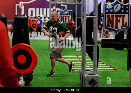 Fans explore the NFL Super Bowl Experience on Thursday, Feb. 10, 2022, in  Los Angeles. (Adam Hunger/AP Images for NFL Stock Photo - Alamy