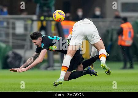 Inter Milan's Alessandro Bastoni, left, heads the ball past Manchester  City's Erling Haaland during the Champions League final soccer match  between Manchester City and Inter Milan at the Ataturk Olympic Stadium in