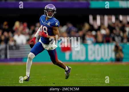 NFC wide receiver Justin Jefferson of the Minnesota Vikings (18) runs a  route against the AFC