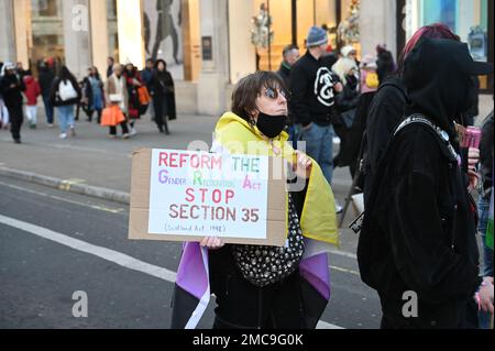 Regent street, London, UK, 21 January 2023: Trans right march through Regent Street, Fight for Section 35. Protest the UK government's attempt to block the Scottish GRA reform and stand in solidarity with this disgusting attack on trans people. Credit: See Li/Picture Capital/Alamy Live News Stock Photo