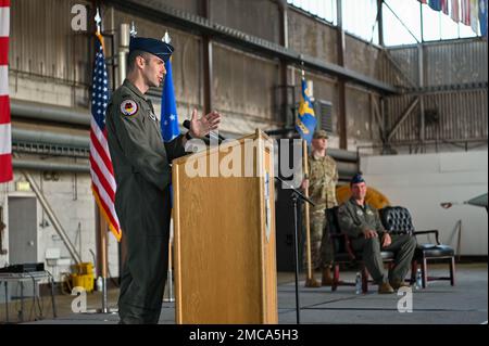 Col. Thomas Graham, 52nd Operations Group commander, renders the first ...