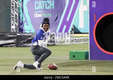 AFC wide receiver Stefon Diggs of the Buffalo Bills, left, and NFC  cornerback Trevon Diggs of the Dallas Cowboys pose with the jerseys each  player signed for the other after the AFC