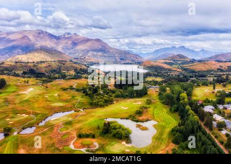 Scenic aerial mountain valley at Arrowtown to lake Hayes in Otago region of New Zealand. Stock Photo