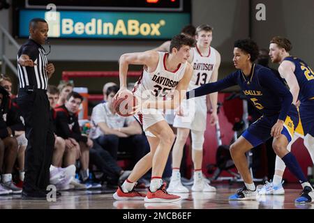 La Salle guard Jack Clark (5) is guarded by Davidson guard Desmond