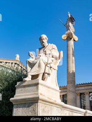 A picture of the Plato Statue and the Athena Column of the Academy of Athens. Stock Photo