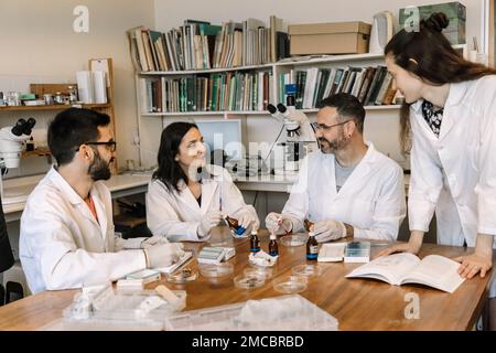 Biologists and scientists studying and researching in chemistry lab . Stock Photo
