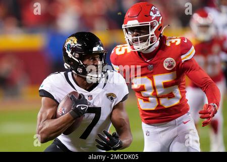 Kansas City Chiefs cornerback Jaylen Watson (35) celebrates an interception  against the Jacksonville Jaguars during an NFL Divisional Playoff football  game Saturday, Jan. 21, 2023, in Kansas City, Mo. (AP Photo/Ed Zurga