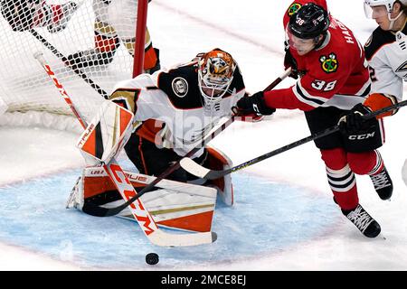 A shot by Chicago Blackhawks' Brandon Hagel (not shown) scores past New  Jersey Devils goaltender Jon Gillies (32) during the second period of an  NHL hockey game Friday, Feb. 25, 2022, in