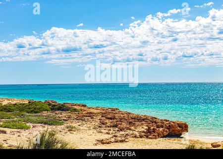 Rugged and wild beach at Osprey Bay in Cape Range National Park if Western Australia's Coral Coast, Australia. Stock Photo