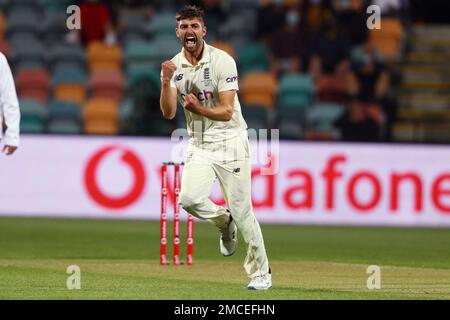 England's Mark Wood celebrates taking the wicket of Australia's Cameron Green during their Ashes cricket test match in Hobart, Friday, Jan. 14, 2022. (AP Photo/Tertius Pickard)