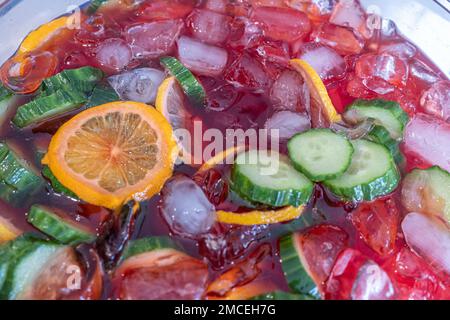 fruit punch in a drink dispenser at a party Stock Photo - Alamy