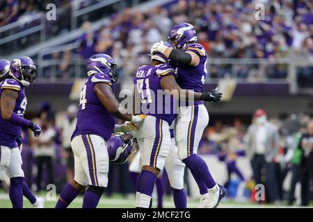 Las Vegas Raiders quarterback Jarrett Stidham is tackled by Minnesota  Vikings defensive tackle T.Y. McGill during the first half of an NFL  preseason football game, Sunday, Aug. 14, 2022, in Las Vegas. (