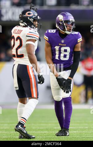 Minnesota Vikings wide receiver Justin Jefferson (18) catches the ball  ahead of New Orleans Saints cornerback Marshon Lattimore (23) during the  fourth quarter of an NFL match between Minnesota Vikings and New